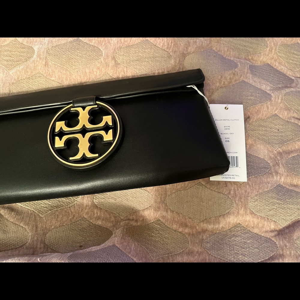 Tory Burch Miller Metal Clutch.         Brand new never worn.